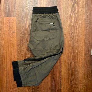 Lorna Jane “Life” olive green/black capri length track pant. Size medium